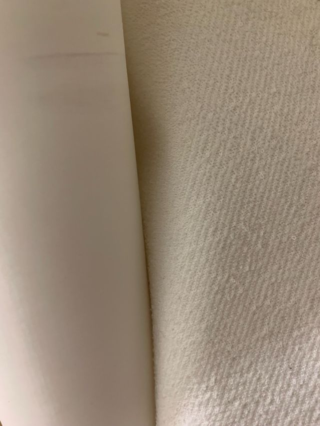 Rollo rizo impermeable y 2 retales