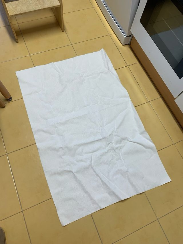 Rollo rizo impermeable y 2 retales