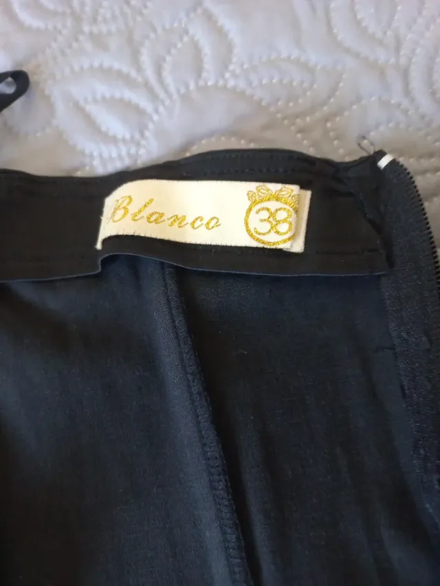 Corsé negro con pedrería y detalles plateados