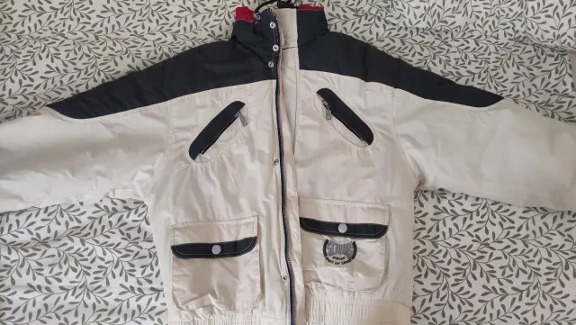 Anorak Schuss beige y gris unisex.