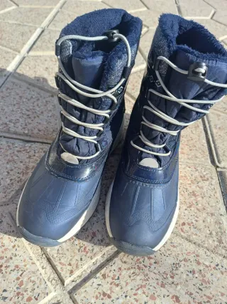 Botas de nieve niña azul y plateado