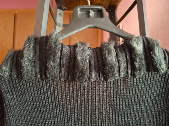 Chaqueta larga negra con cinturón