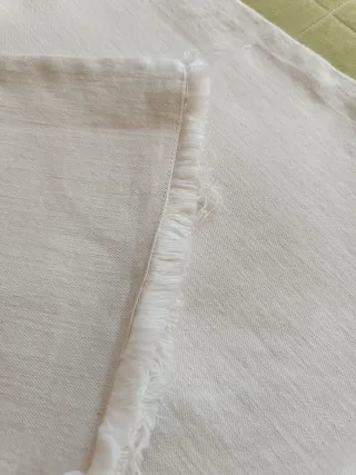 Pantalón flare beige con flecos