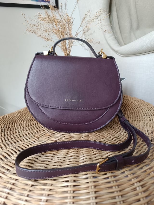 Borsetta Coccinelle viola con dettagli oro