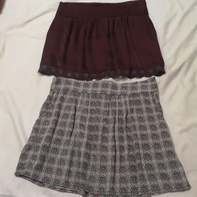 2 faldas cortas con bolsillos laterales