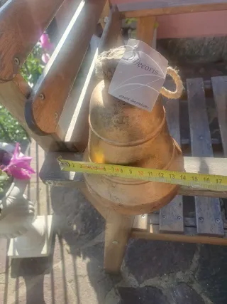 Campana decorativa in metallo dorato