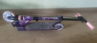 Patinete morado Oxelo