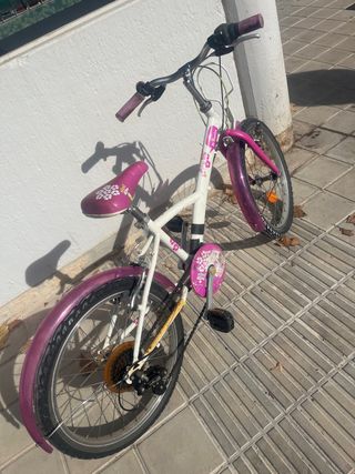 Bicicleta niña rosa y blanca