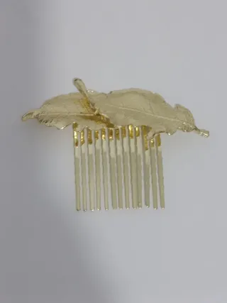 Adorno pelo hoja dorado