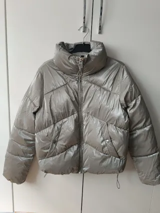 Plumas mujer color gris, talla XS.