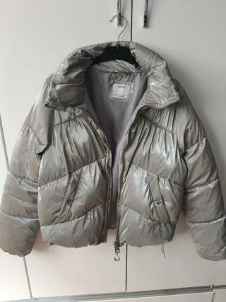 Plumas mujer color gris, talla XS.