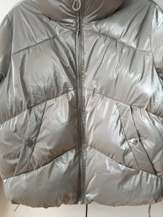 Plumas mujer color gris, talla XS.