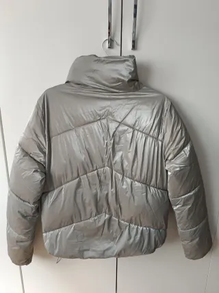 Plumas mujer color gris, talla XS.