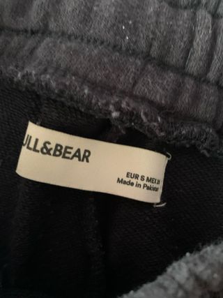 Pantalones deportivos negros con rayas