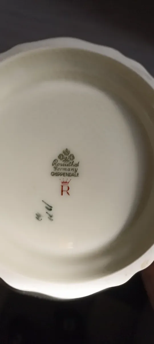 Taza de café con platillo y cuchara