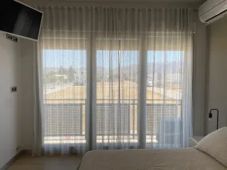 Cortinas dormitorio/salón grises y blancas