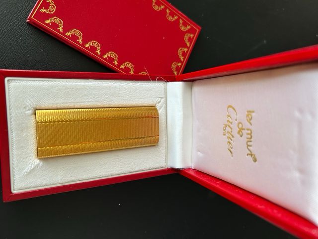 Encendedor Cartier Les Must Dorado