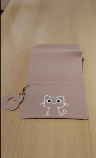 Monedero rosa con dibujo de gato