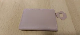 Monedero rosa con dibujo de gato