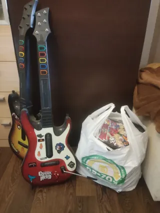 Xbox 360 con 2 mandos y 2 guitarras,cámara