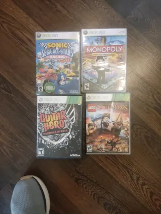 Xbox 360 con 2 mandos y 2 guitarras,cámara