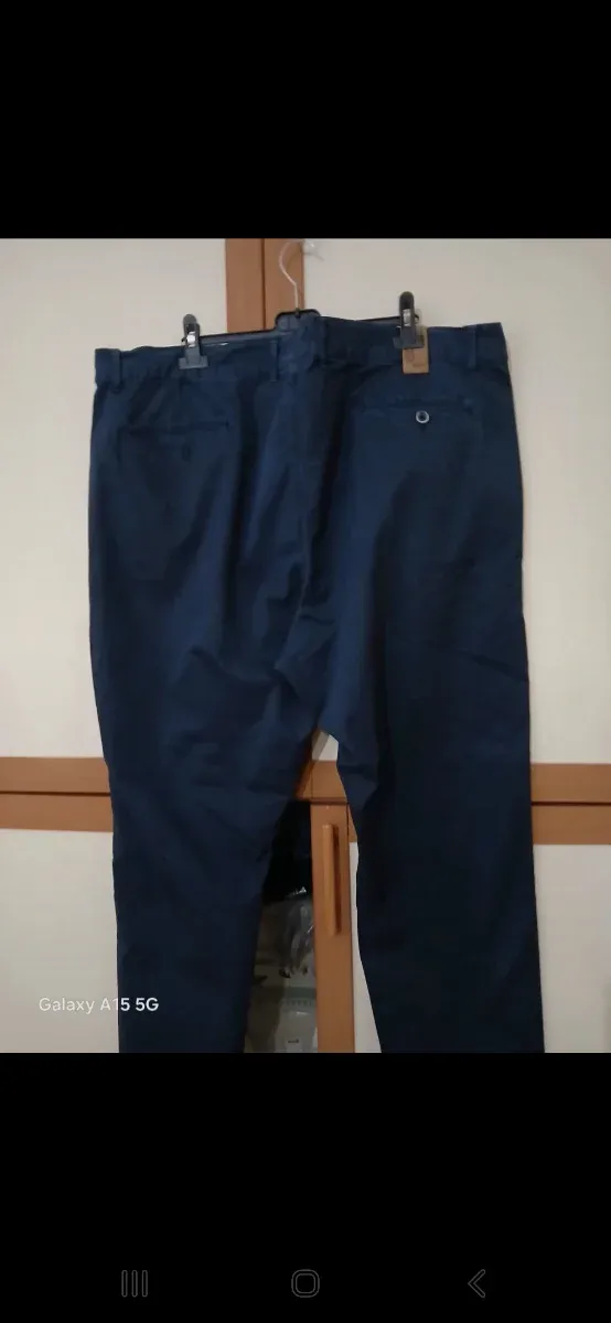 Completo uomo camicia blu e pantaloni neri