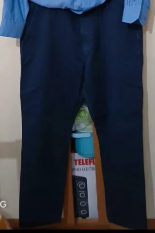 Completo uomo camicia blu e pantaloni neri