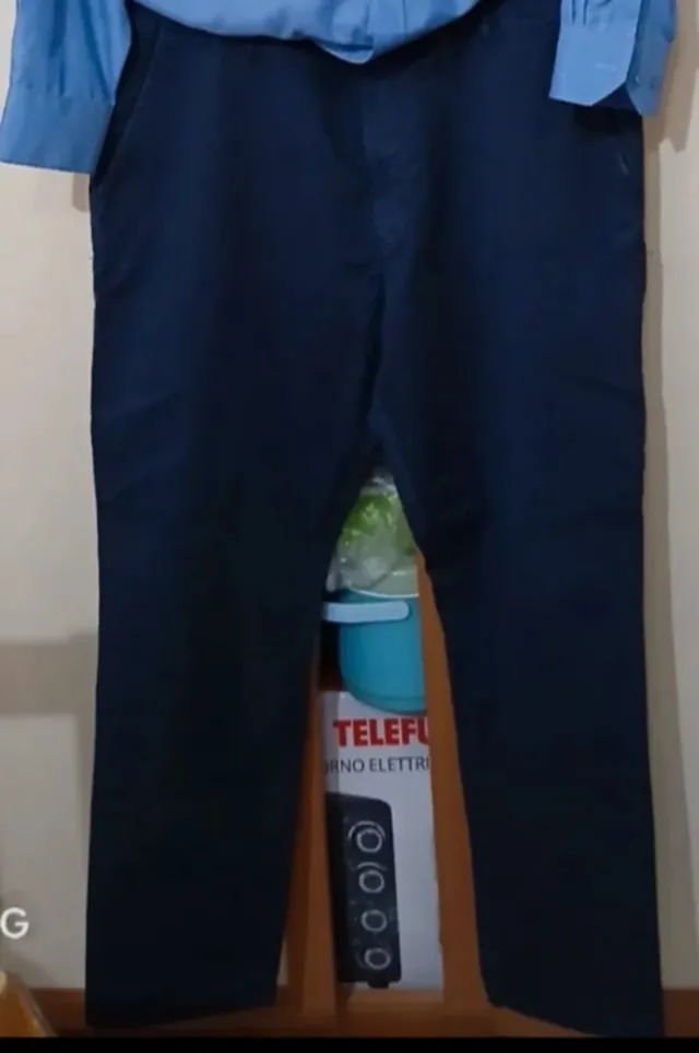 Completo uomo camicia blu e pantaloni neri