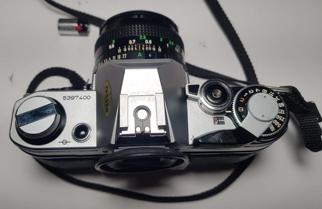 Canon AE-1 + Lente FD 50mm 1:1.8 + Accesorios