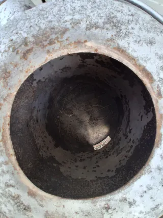 Estufa de leña redonda metálica