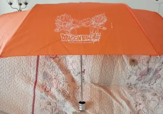 PARAGUAS NARANJAS COMPACTOS DE DRAGON BALL SUPER