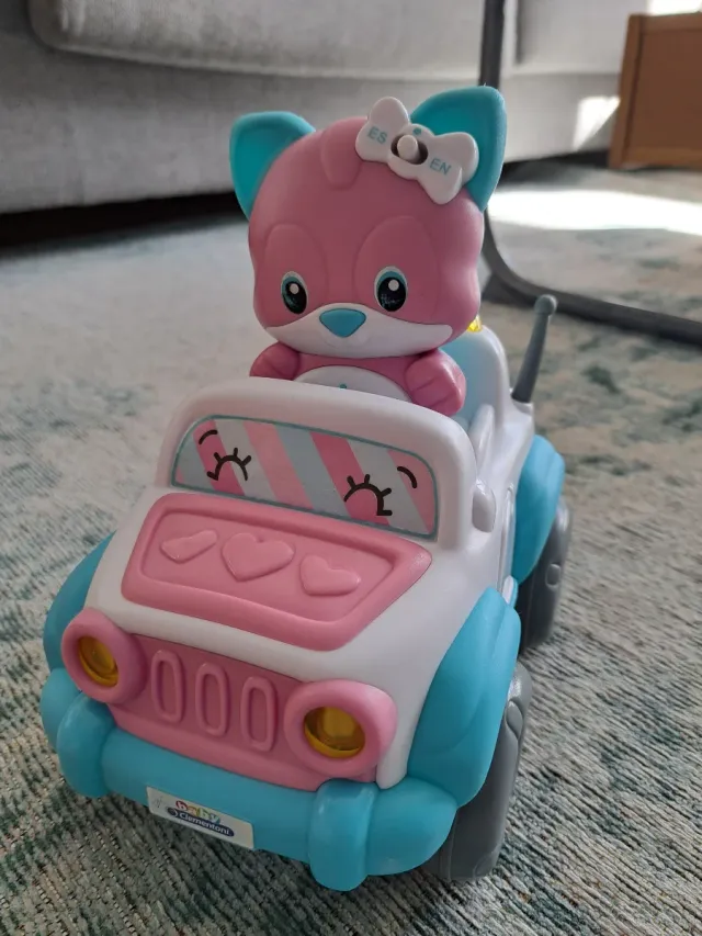 Cochecito de juguete rosa y azul