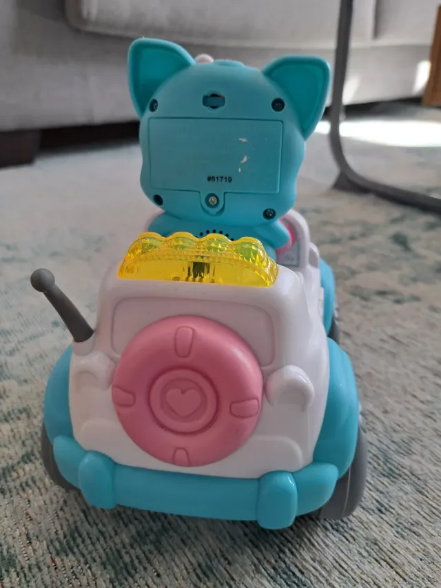 Cochecito de juguete rosa y azul