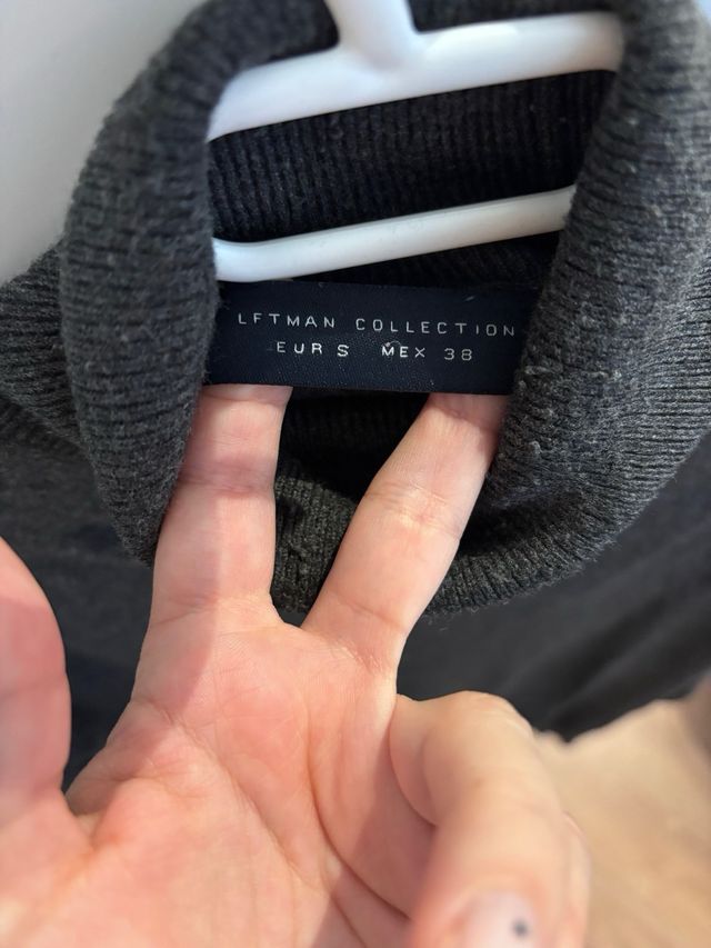 Jersey cuello alto gris