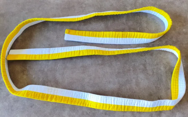 Cinturón blanco/amarillo Outshock