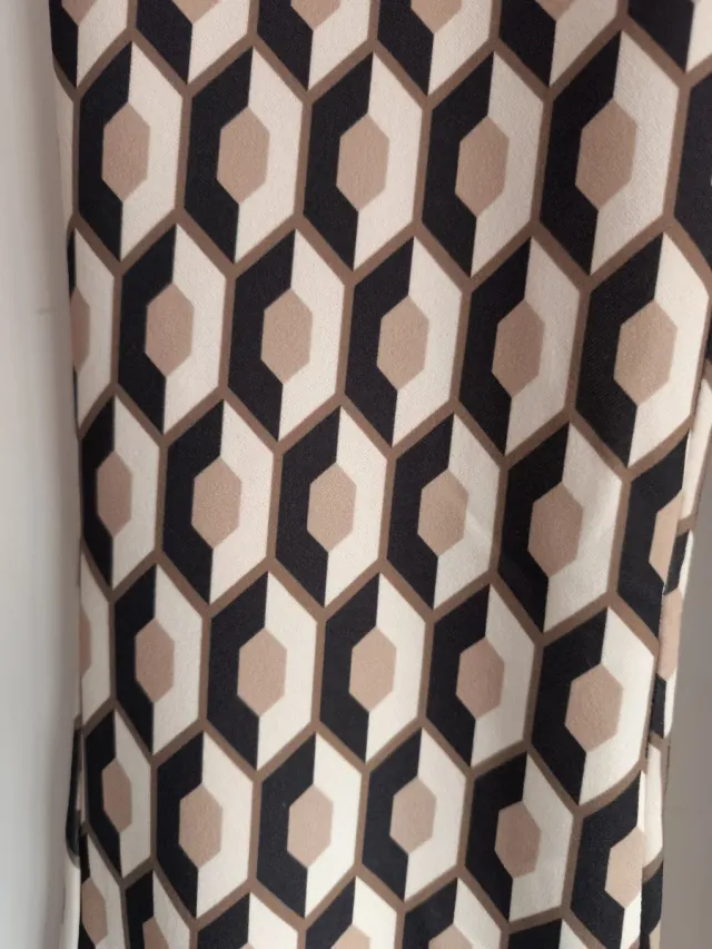 Pantalones acampanados estampado geométrico