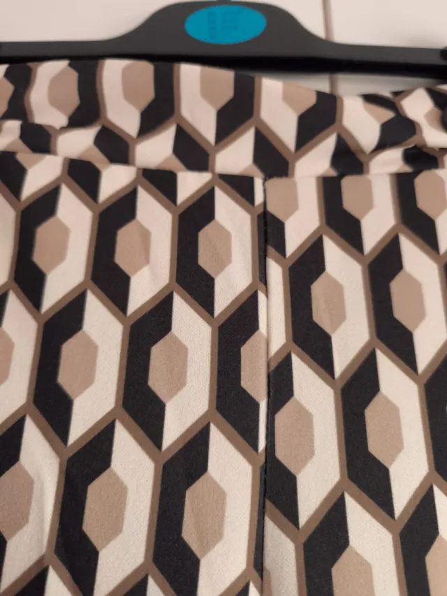 Pantalones acampanados estampado geométrico