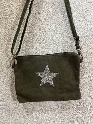 Bolso verde con estrella brillante