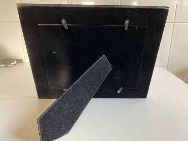 Marco de fotos de piel negro  sin marca