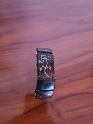 Pulsera artesanal de coco tallado