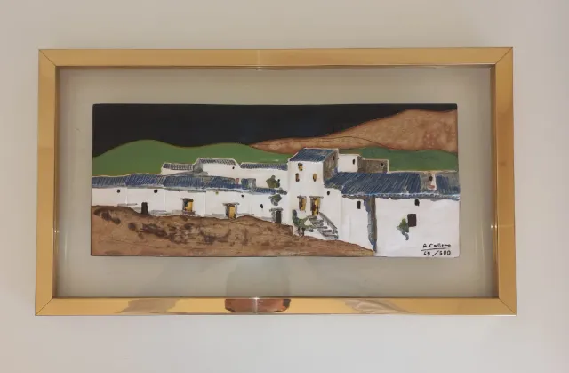 Cuadro de cerámica con marco metálico