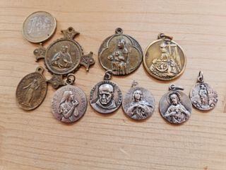 Lote 9 medallas religiosas