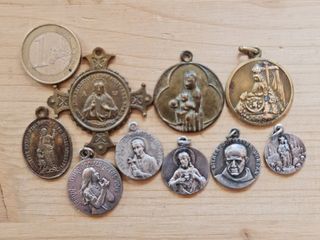 Lote 9 medallas religiosas