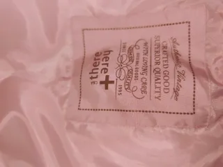 Cazadora niña con gorro de pelo rosa