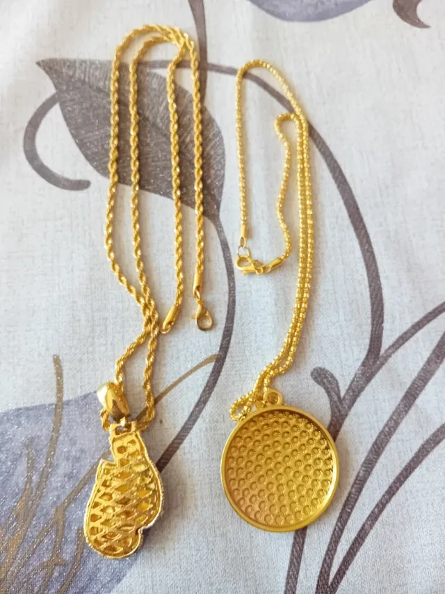 2 Colgantes: Ojo Turco y Guantes Boxeo