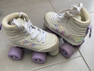 Patines de niña blancos con ruedas moradas