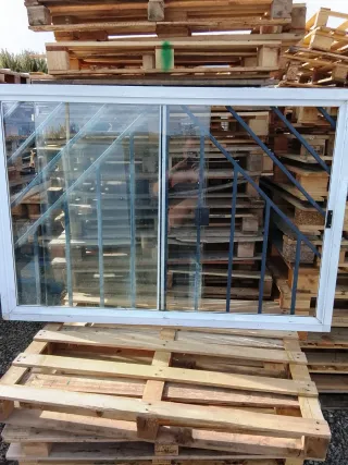 Ventana aluminio corredera con rejas