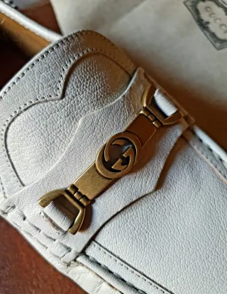 Mocasines Gucci Blanco y Dorado