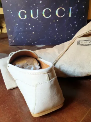 Mocasines Gucci Blanco y Dorado