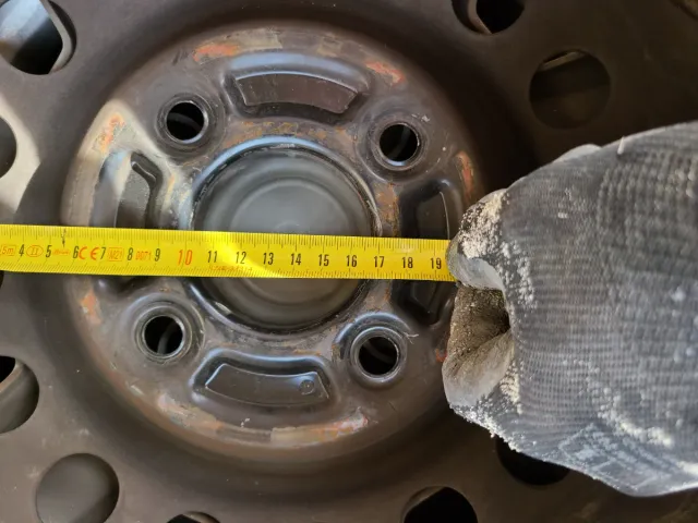 4 Llantas 15" Mitsubishi con tapacubos